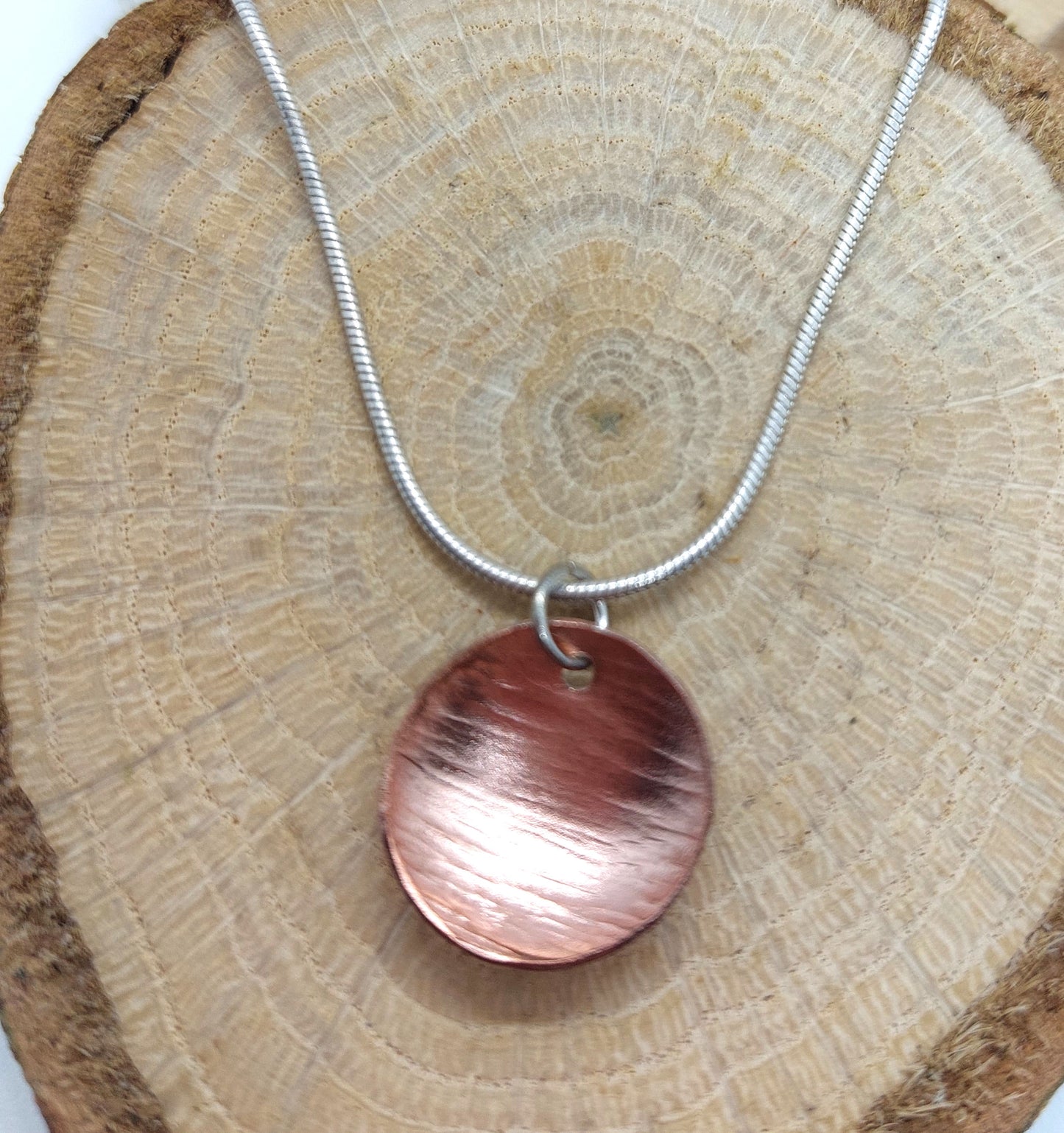 Copper disc pendant image 0